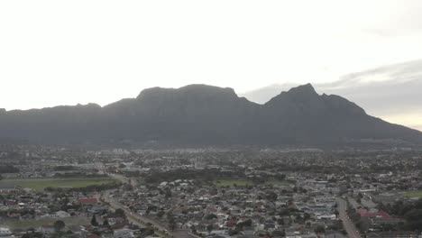 aerial shots of table mountain from the southern suburbs of cape town
