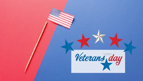 Animación-Del-Texto-Del-Día-De-Los-Veteranos-Y-Estrellas-Sobre-La-Bandera-De-Los-Estados-Unidos-De-América