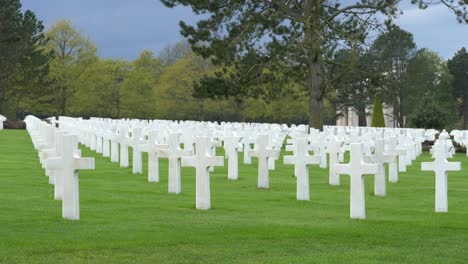 white cross grave of world war two troops in normandy american cemetery and memorial, colleville sur mer, normandy, france