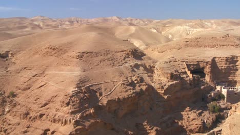 Pan-across-to-the-Christian-monastery-of-St-Georges-in-the-Judean-hills-near-the-Dead-Sea