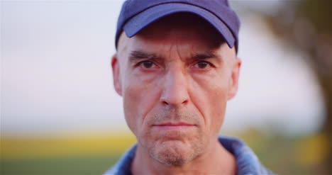 very nervous adult man looking into camera