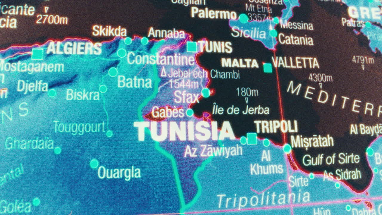 Close-up of an illuminated map showing North Africa and the Mediterranean Sea