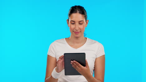 Tablet,-app-and-smile-with-a-woman-on-a-blue