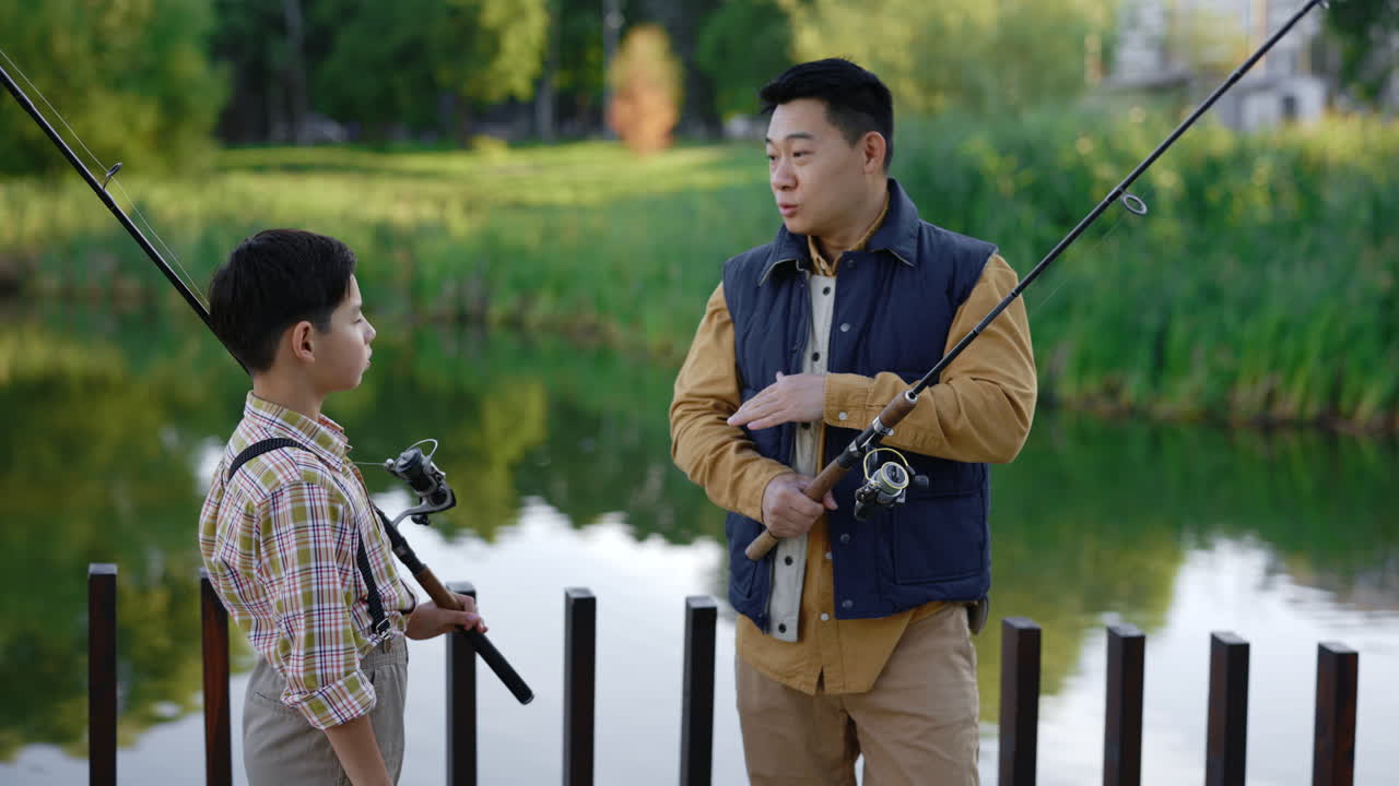 Father and Son Fishing in the Park