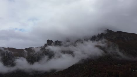 white clouds covering a mountain are nature's embrace and admiring them brings with it nostalgia and a cold ambiance that provokes feelings of vacation in winter