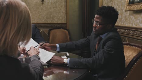 african american lawyer giving consultation about business agreement