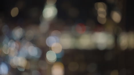 city reflection at night with illuminated buildings