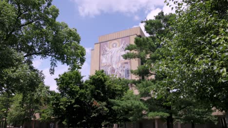 hesbaugh library, touchdown jesus, on the campus of notre dame university in south bend, indiana with gimbal video walking forward