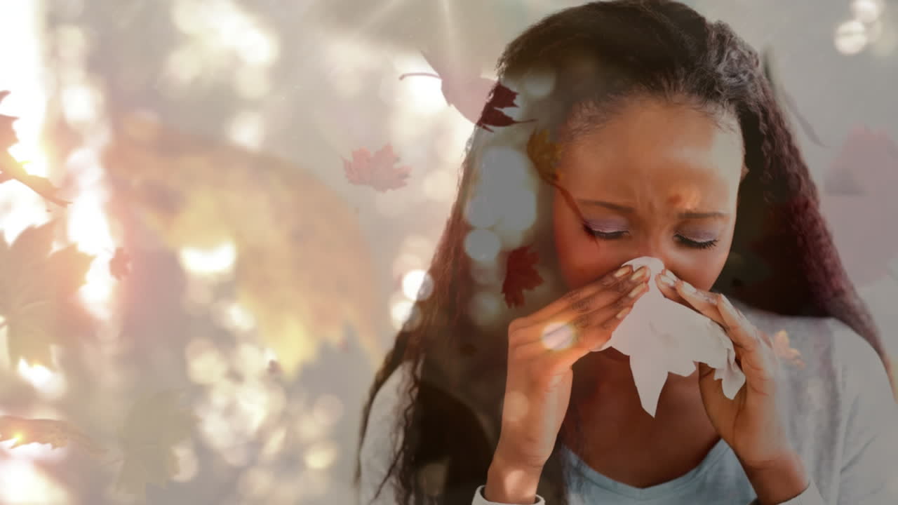 Foglie autunnali che cadono e donna che starnutisce mentre soffre di allergia 4k