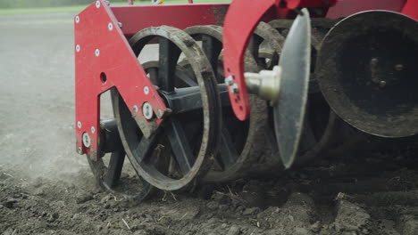 Blades-cultivator-and-seeder-sowing-machine-working-on-agricultural-field