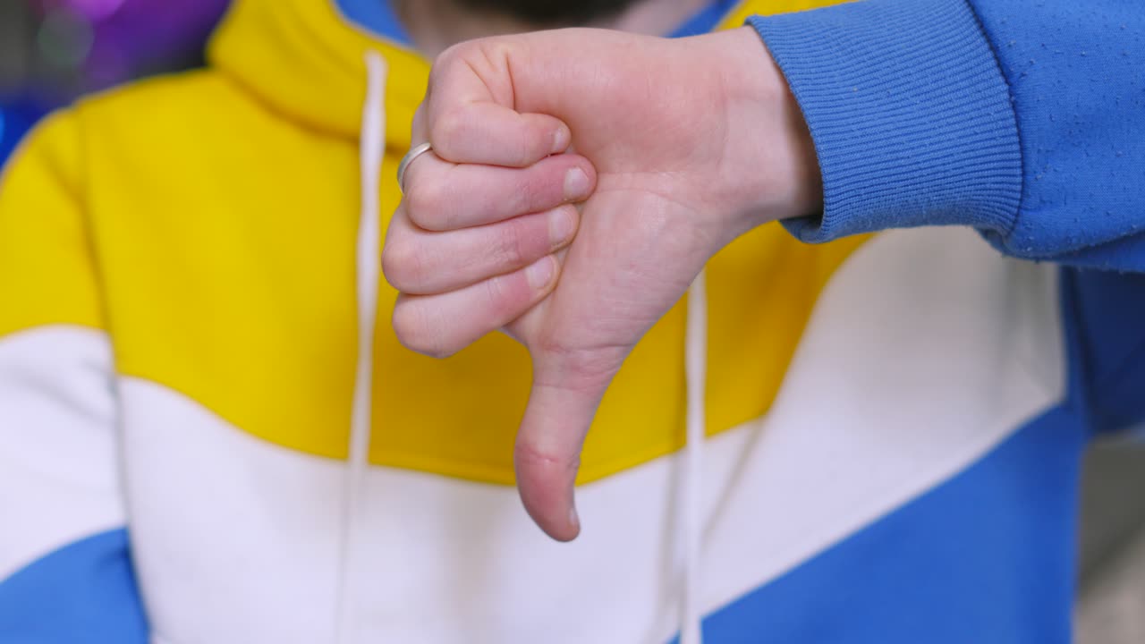 Male Person Giving Thumbs Down to an Idea or Action. Illustrative Sign of Displeasure About a Subject. Concept People Footage.