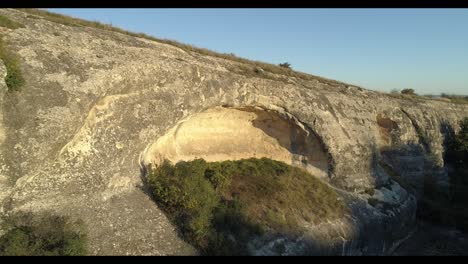 natural arch in a rocky hillside