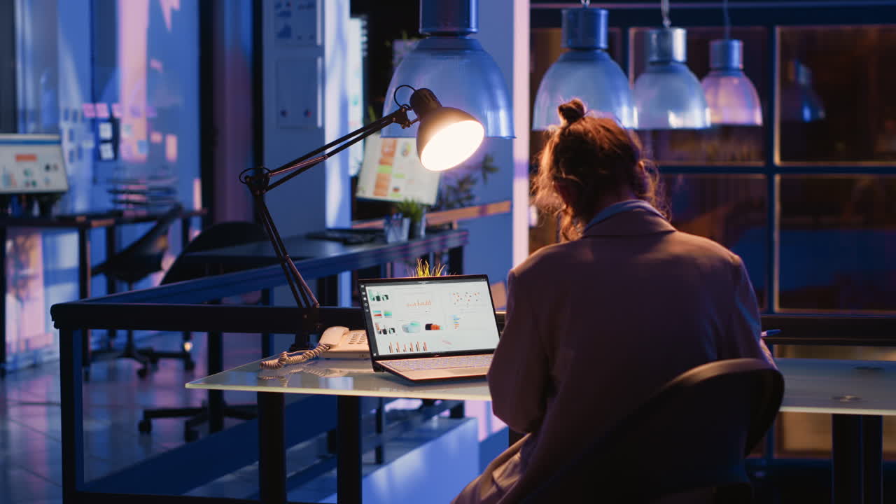 Office interior with laptop and desk