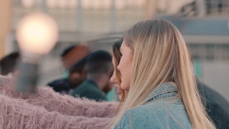 beautiful young women friends taking selfie photo using smartphone enjoying rooftop party sharing weekend lifestyle on social media having fun celebrating friendship