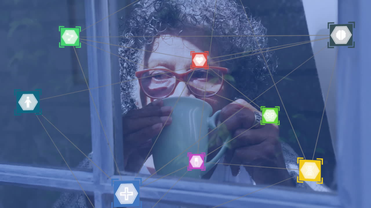 Animation of network of connections with icons over senior african american woman