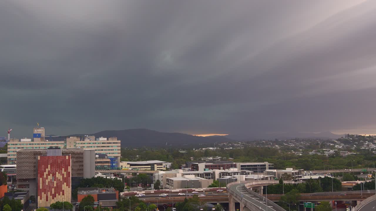 Time-lapse shot of a wild storm clouds loom over Brisbane, unleashing lightning strikes and intense thunderstorms across Southeast Queensland
