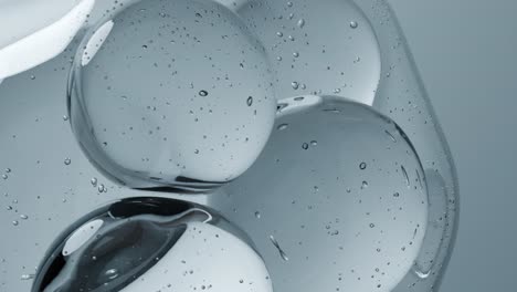 macro view of 3d water bubbles on a gray background