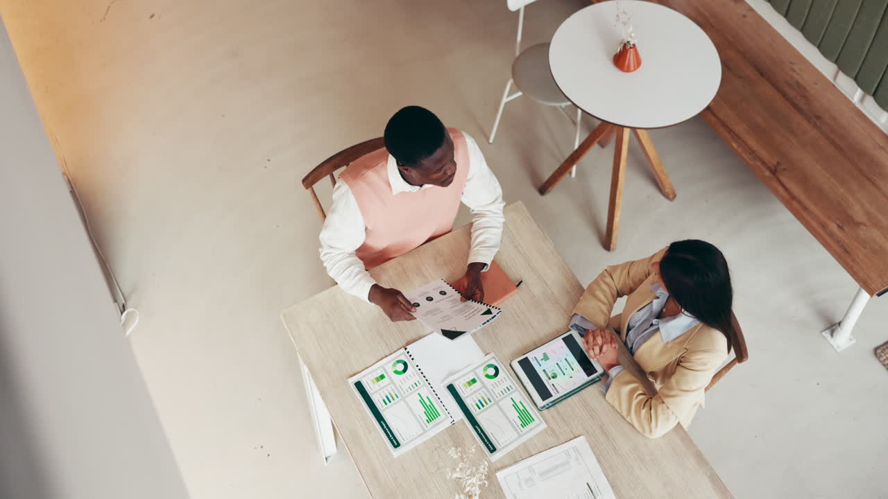 Business Meeting with Handshake and Collaboration