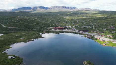 geilo norway - ustedalsfjorden lake, small mountain village and winter sport ski area during summer in viken - aerial