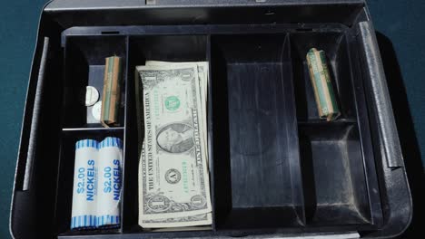 money disappears from cashbox. bankruptcy or a quick waste of money concept