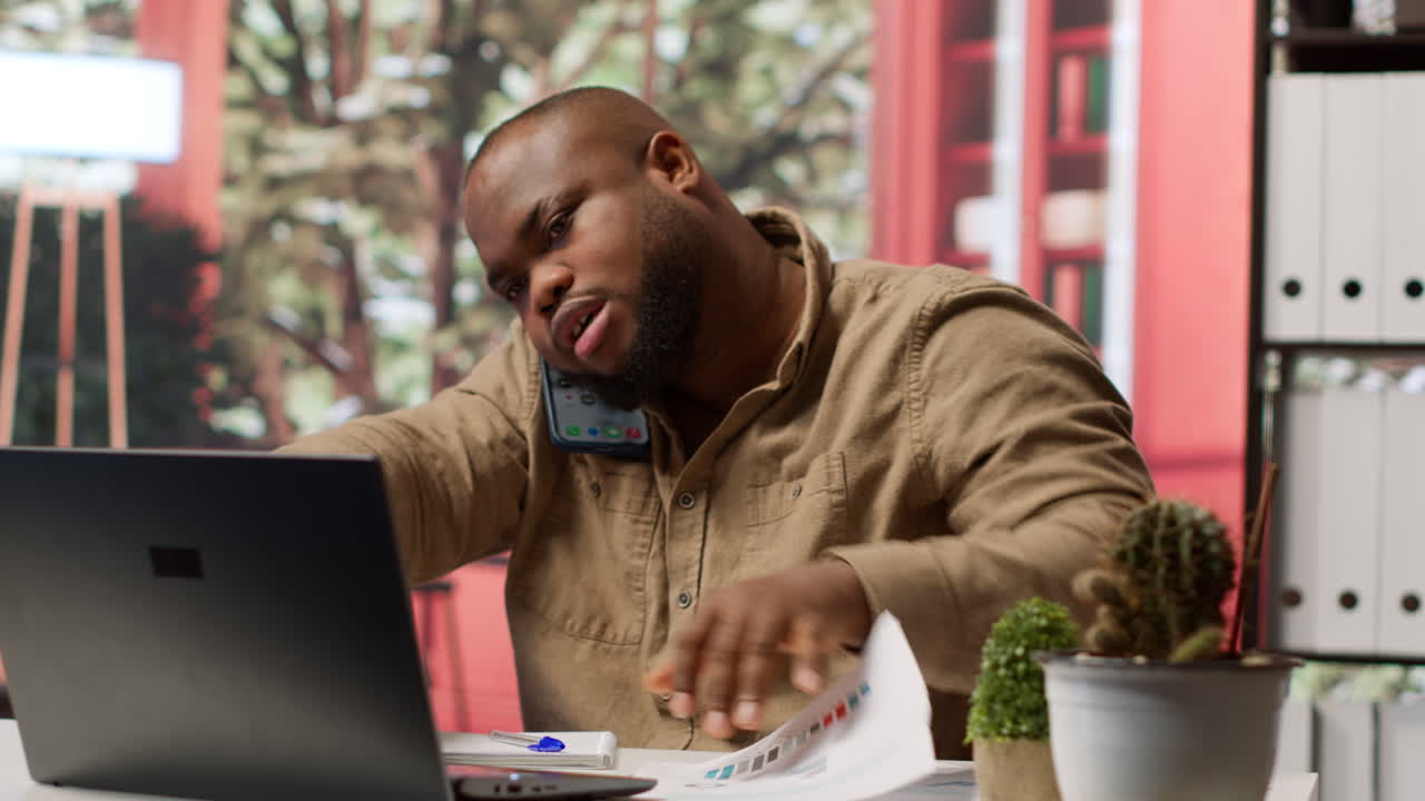 Financial consultant answering a phone call from a stakeholder at home