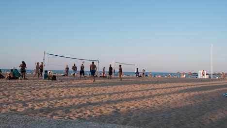 valencia beach people playing voleyball