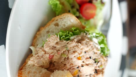 tuna salad sandwich with vegetables