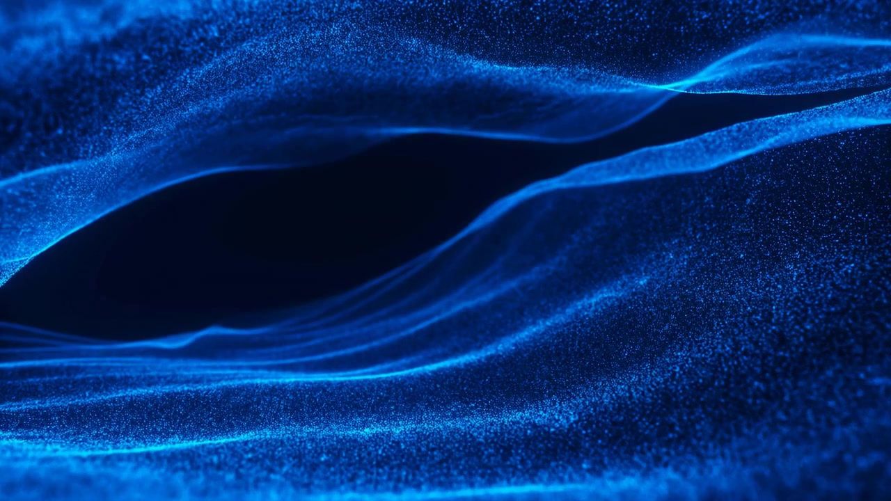 Layered blue particle waves drift across deep navy negative space, unfolding into ribbon bands with subtle separation, tightening movement, soft glow, and abstract depth, with blue, particle, ribbon