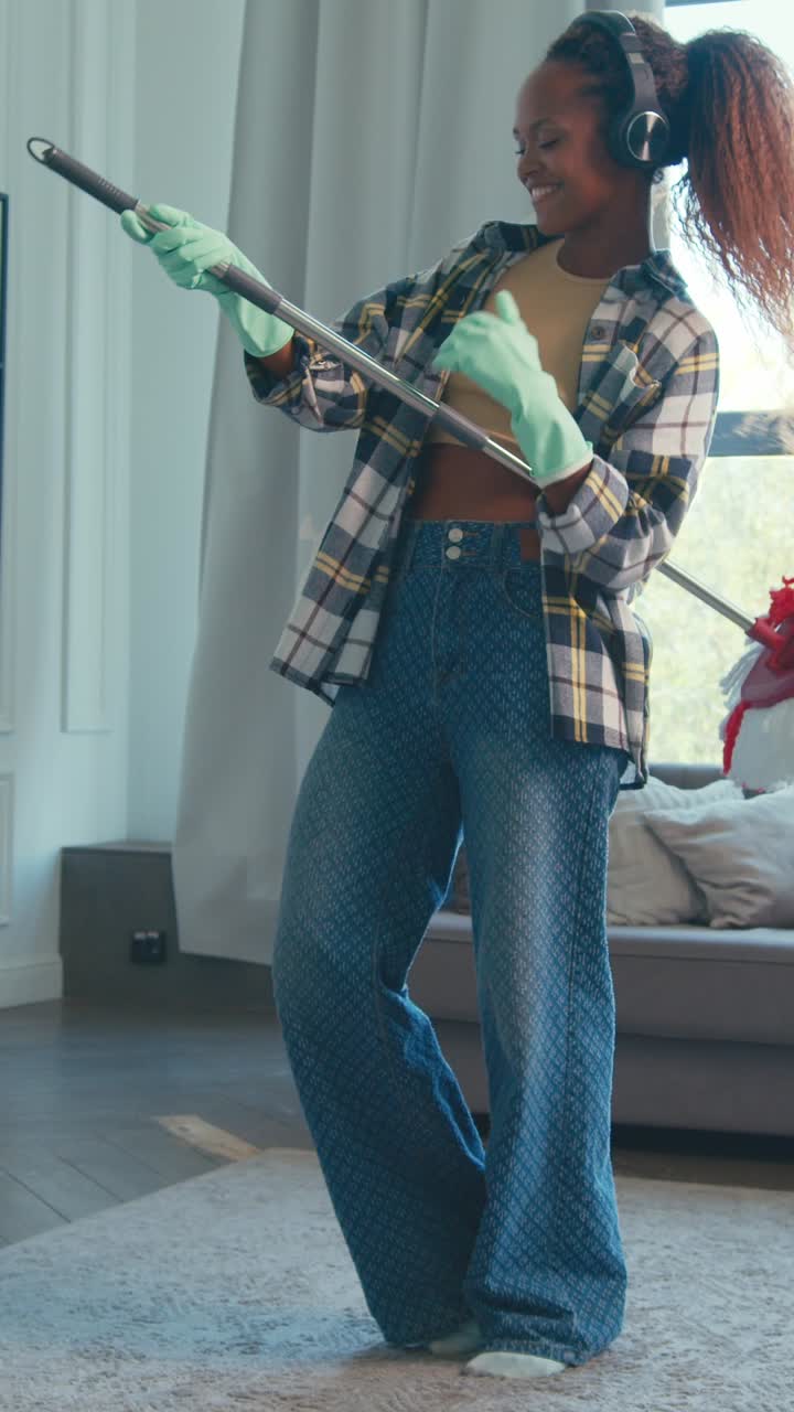 Cleaning the home with style and focus in a bright living room