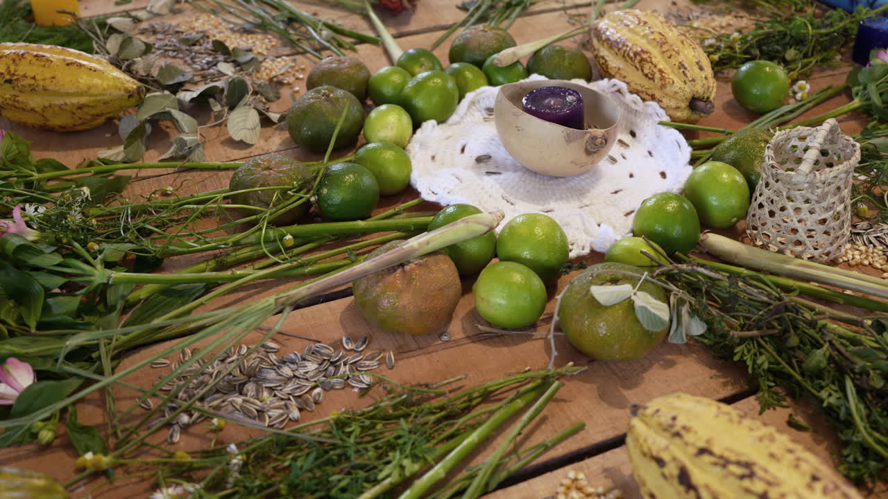 A vibrant close-up shot of an artistic display of mixed produce and seeds arranged in a circle. The fresh ingredients are beautifully spread out on a wooden surface, highlighting textures and colors