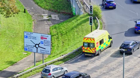 aerial view of ambulance and cars driving in the road in rotherham, england