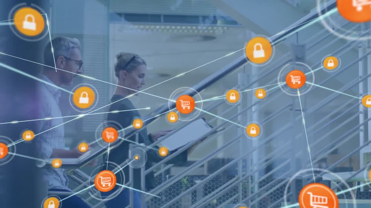 animación de una red de iconos digitales contra un hombre y una mujer caucásicos discutiendo en las escaleras de la oficina.