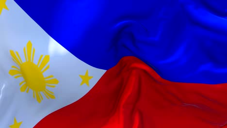 philippines flag waving in wind slow motion animation . 4k realistic fabric texture flag smooth blowing on a windy day continuous seamless loop background.