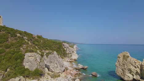 Aerial-drone-clip-towards-a-rock-formation-in-Kavala,-Macedonia,-Greece