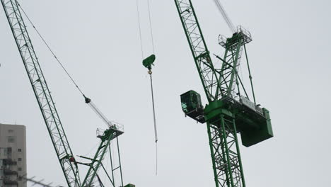 mighty tower crane operational at dusk at hong kong china republic