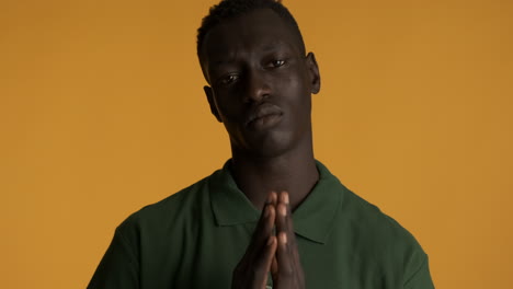 African-american-man-on-yellow-background.