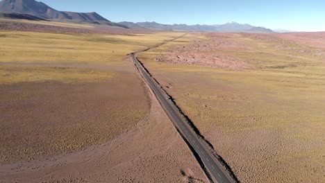 Aerial-view-of-a-desert-road-in-Atacama
