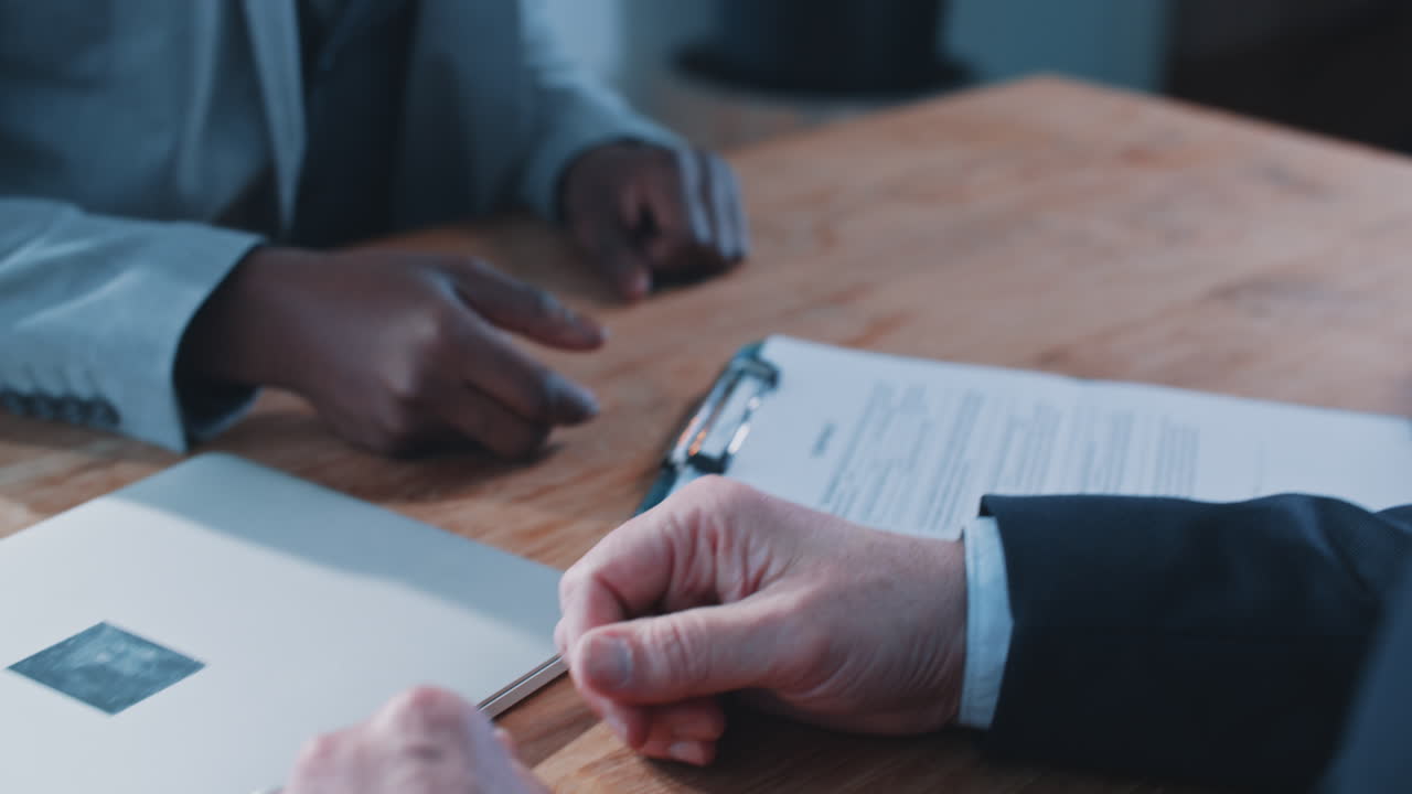 Business Handshake and Contract Signing