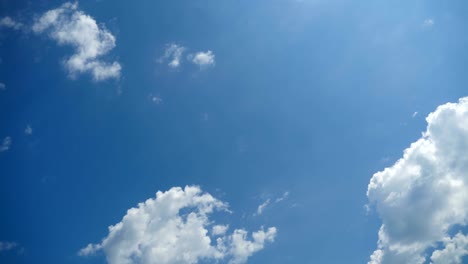 clouds are moving in the blue sky. time lapse