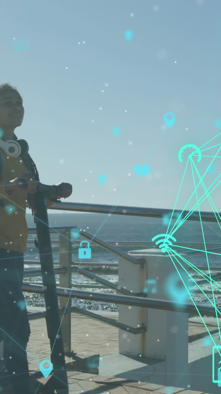 Animation of media icons over biracial woman walking with scooter on promenade