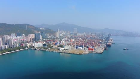 Shenzhen-commercial-Port-terminal-with-docked-Ships-and-Container-yard,-Aerial-view