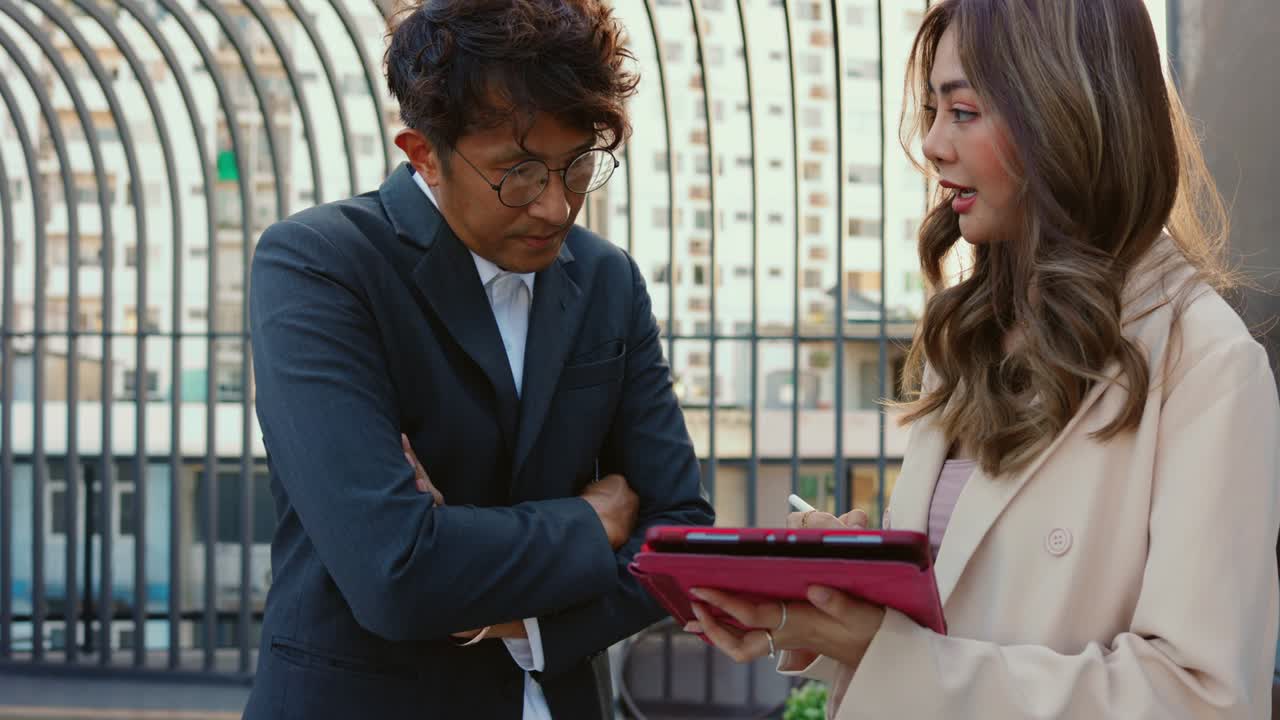 Asian businesswoman presenting new projects to partners