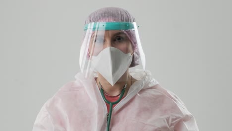 close-up of healthcare worker wearing protective gear