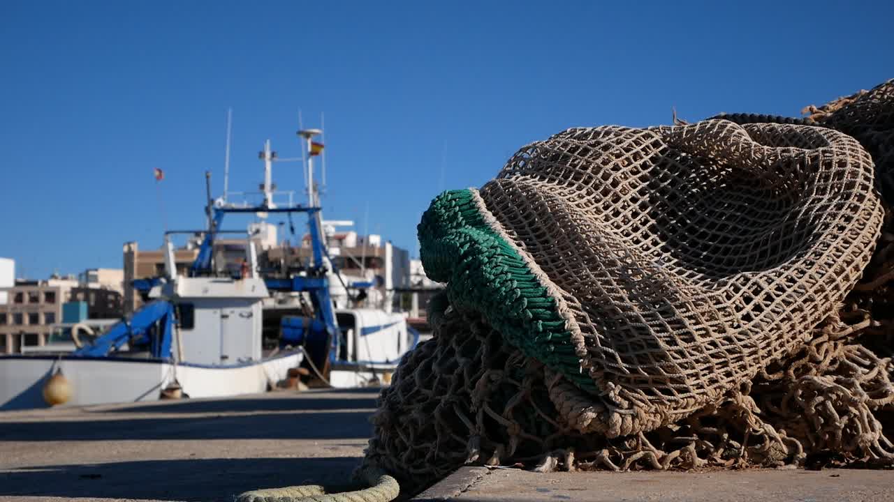 Fishing Nets and Boat in Harbor
