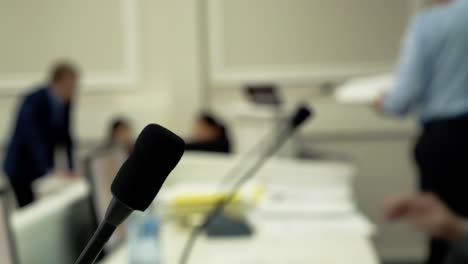 businessmen in the conference hall are preparing