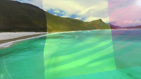 Digital-composition-of-waving-belgium-flag-against-aerial-view-of-the-beach