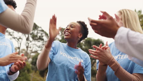 group of volunteers celebrating their success