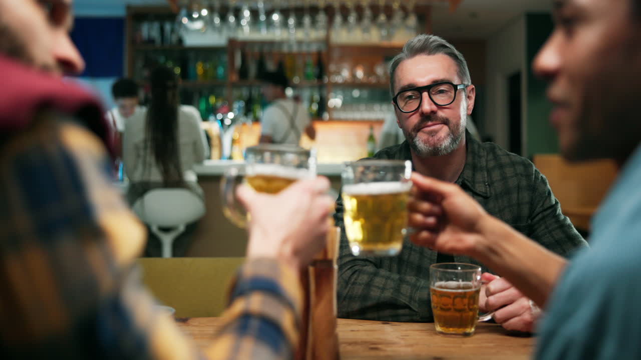 Group of people dining and drinking together