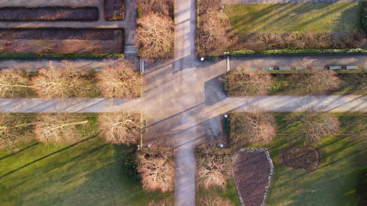 Zoomout birdview droneshot of the Rosengarten in Bern during a wintermorning in early march