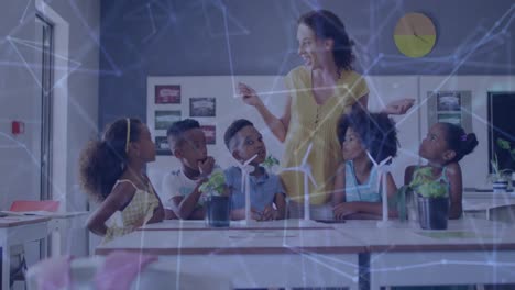 animation of network of connections over happy diverse female teacher and pupils with wind turbines